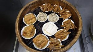 Новото правило на Гуанджоу за ръчно изработените дим суми разпалва дебат за културните храни в Хонконг